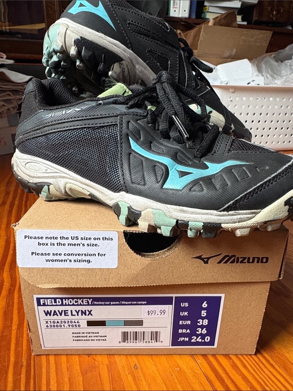 Mizuno Black Field Hockey Shoes with Teal Accents